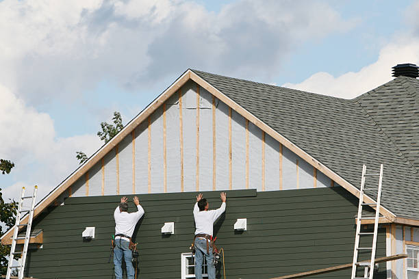 Professional Storm Damage Siding Repair technician working in Mifflinburg, PA